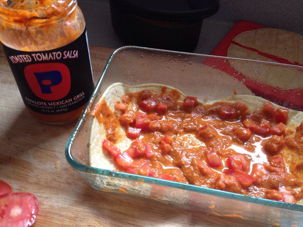 Pour on the sauce! Traditional enchilada sauce with definitely work, I just have some special local salsa that I like to use