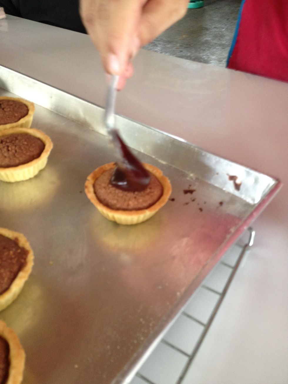 Pour on to the tart.