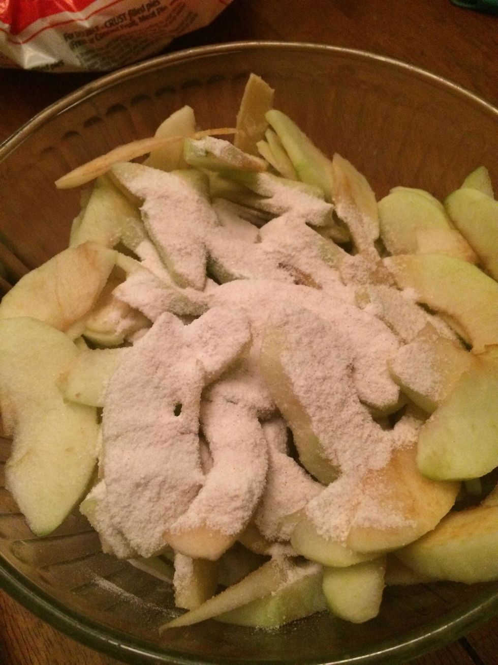 Pour one fourth of the mixture over top of the apples and mix together.