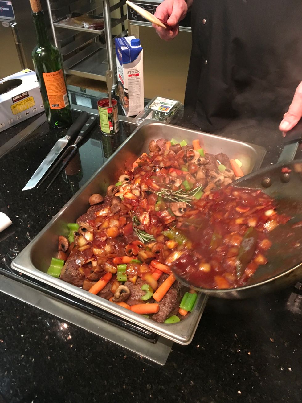 Pour onion mixture evenly over the top of the beef ribs.