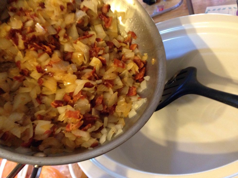 Pour onions and bacon into the crock pot.