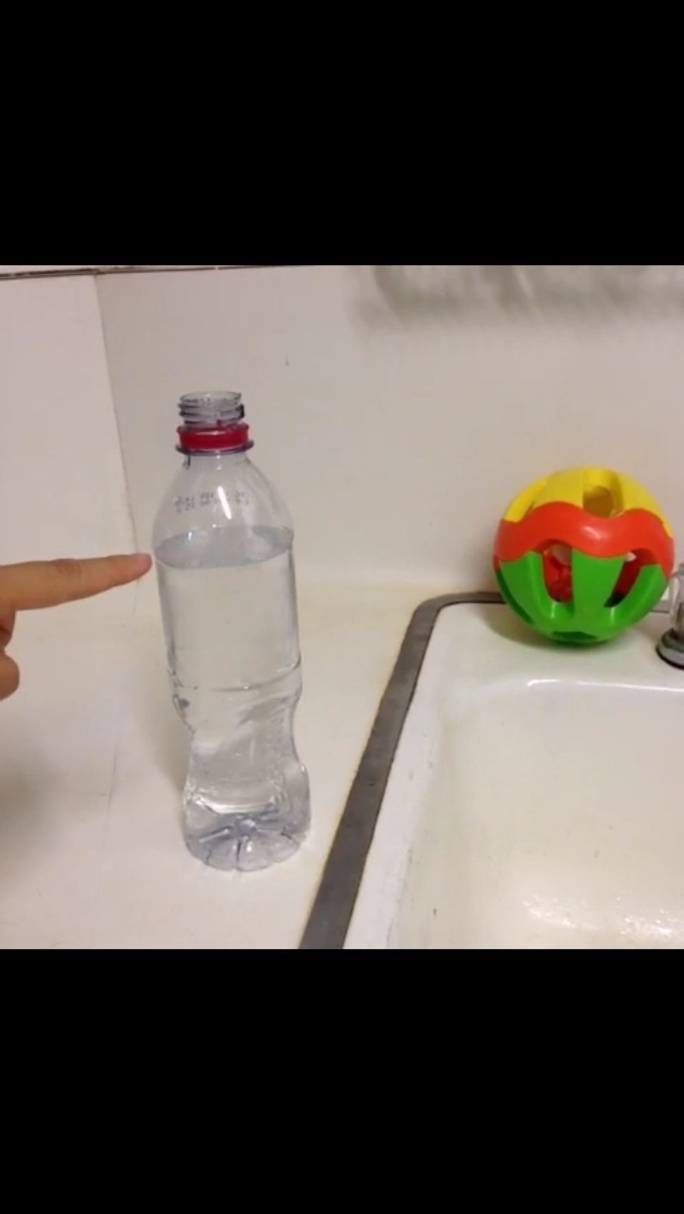 Pour out any water to leave room for the frozen water to expand in the freezer. It should be this full.