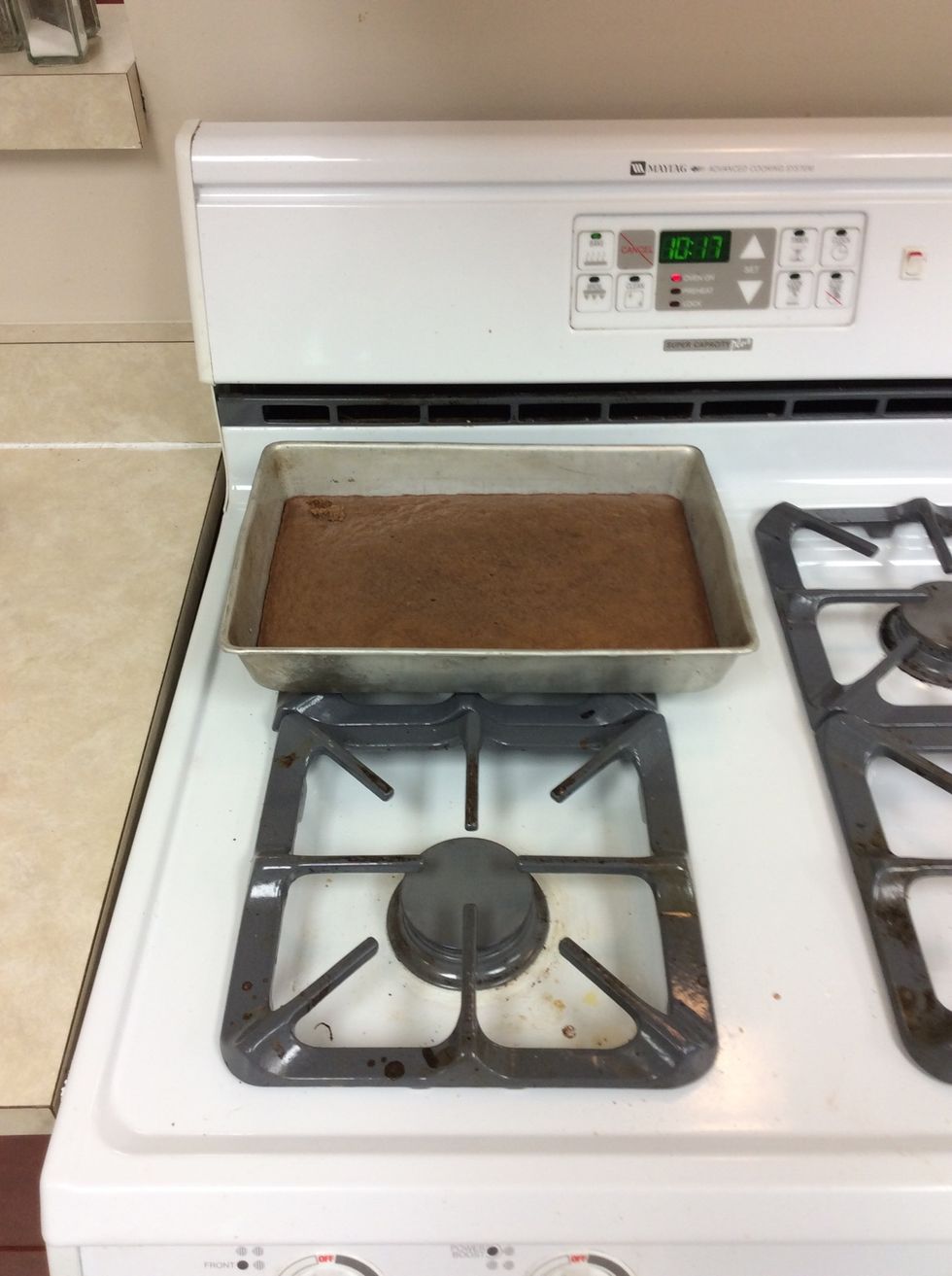 Pour over warm cake. Cool completely on wire rack