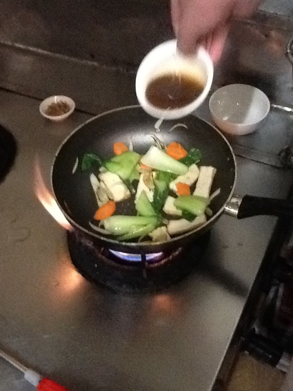 Pour oyster sauce into the pan
