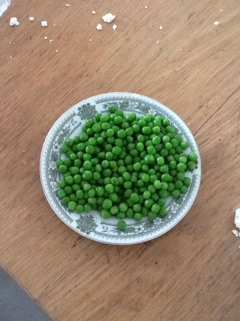 Pour peas into a bowl....