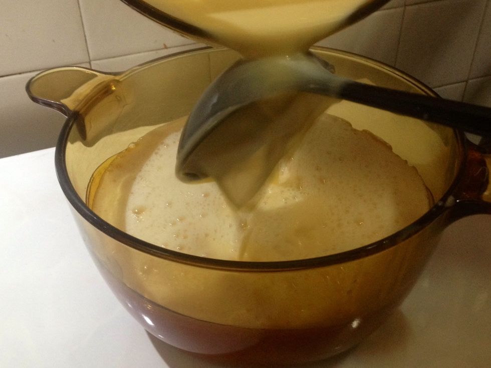 Pour prepared mix into final bowl where you've swirled the caramel in. Use a ladle to reduce turbulence in pouring...