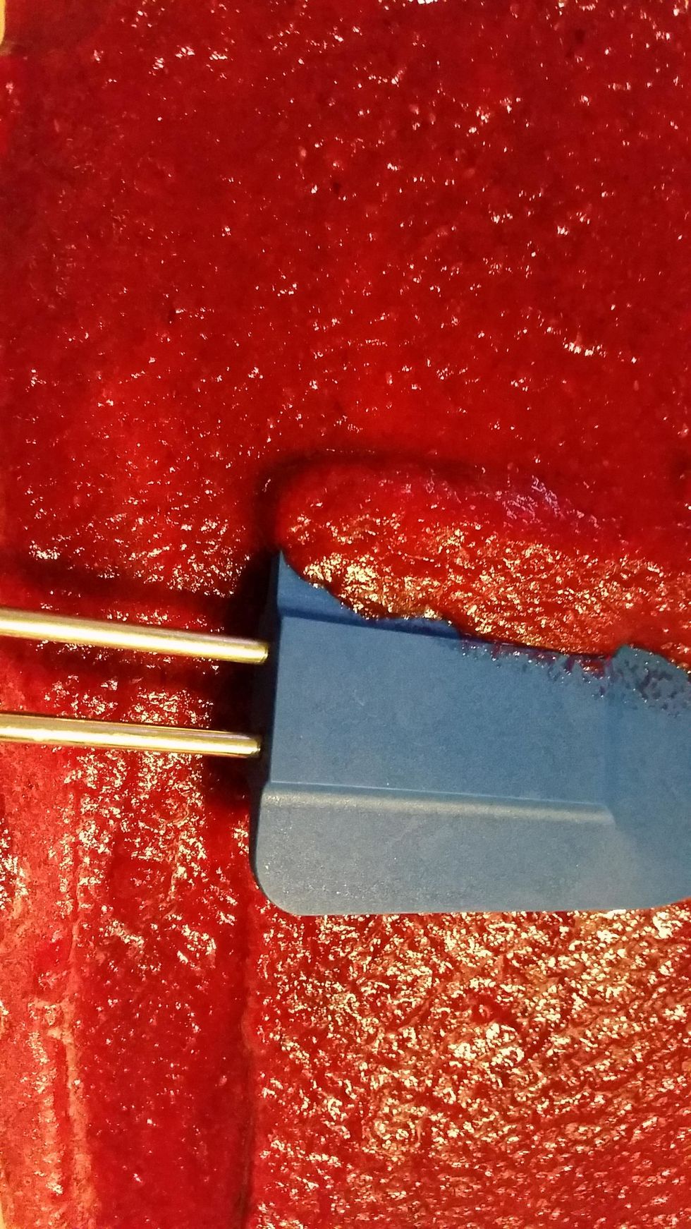 Pour pur\u00e9e onto paper and spread thickly and evenly with a spatula