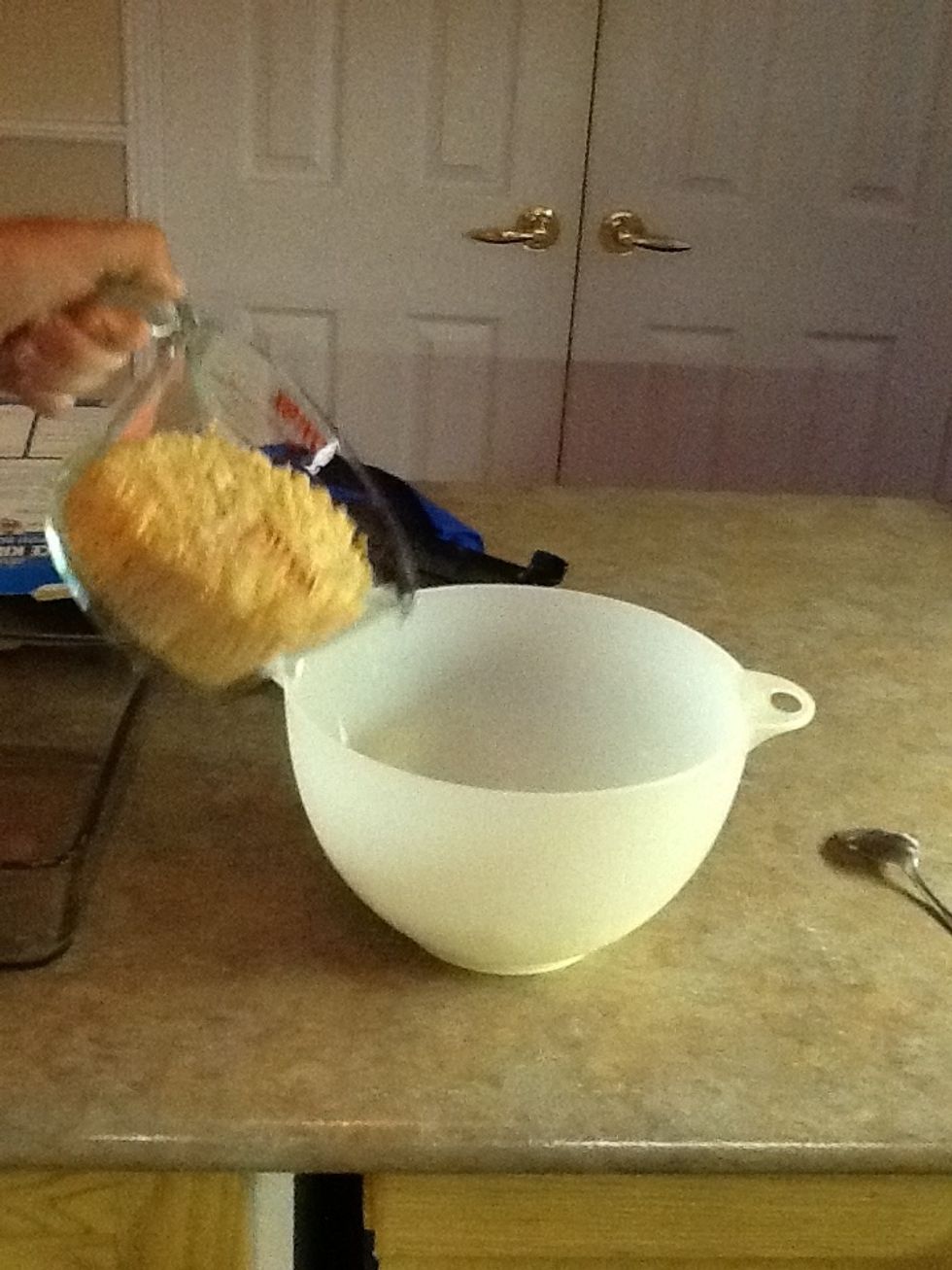 Pour Rice Krispies into bowl with marshmallows