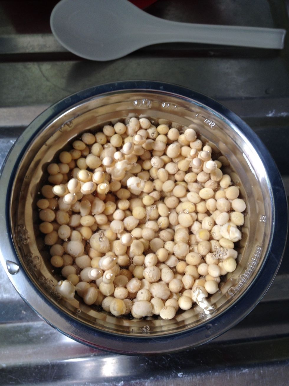 Pour rinsed soybeans into a bowl . Add water and soak soybeans for 9 hours. Be sure there is enough water to cover all soybeans. A very easy step! \ud83d\ude0a