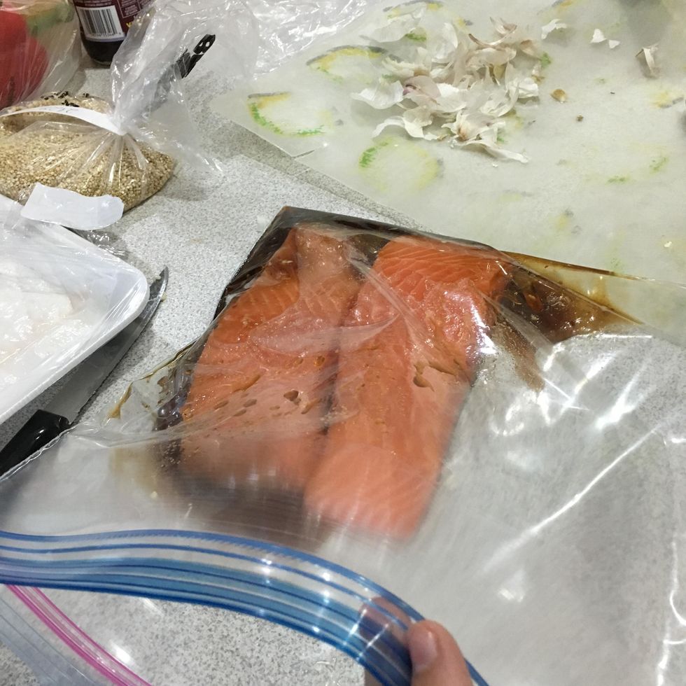 Pour sauce into a large ziplock bag then place the salmon in the bag