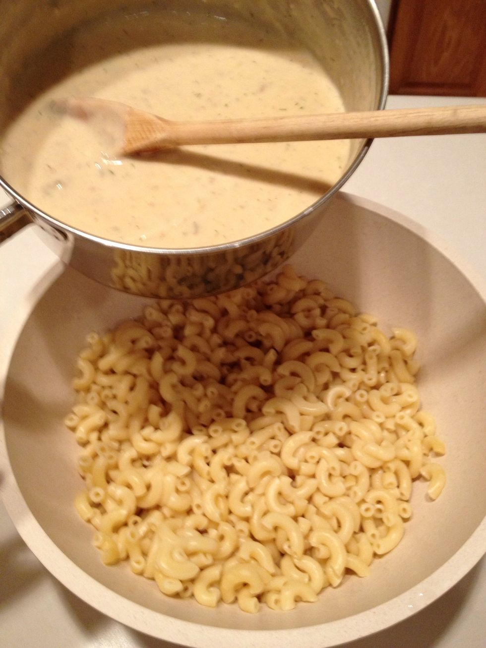 Pour sauce over macaroni.