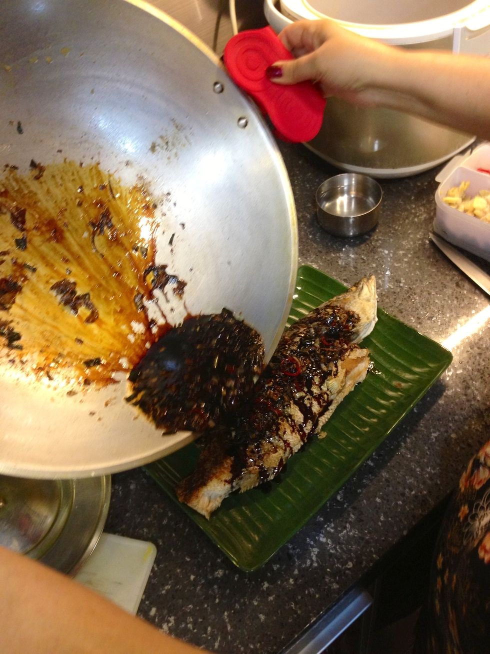 Pour sauce over the sea bass