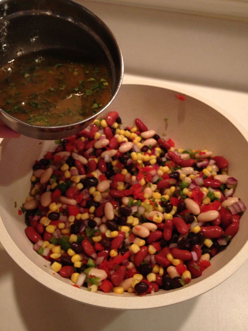 Pour sauce over vegetables and stir well. Place in refrigerator until chilled.