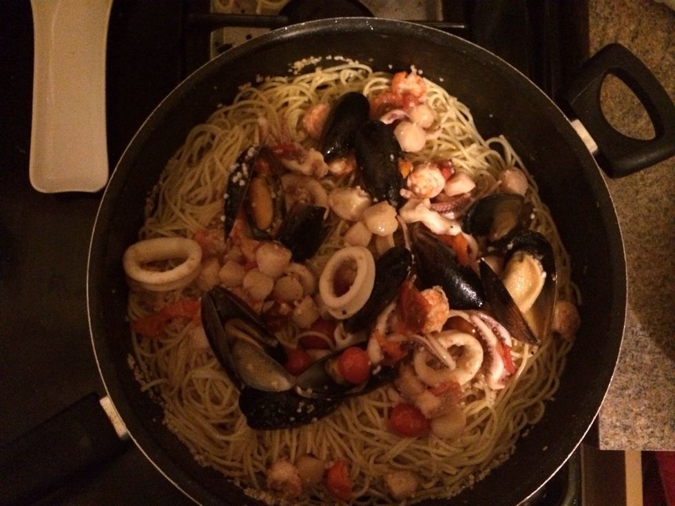 Pour seafood mix on top. Serve and enjoy.