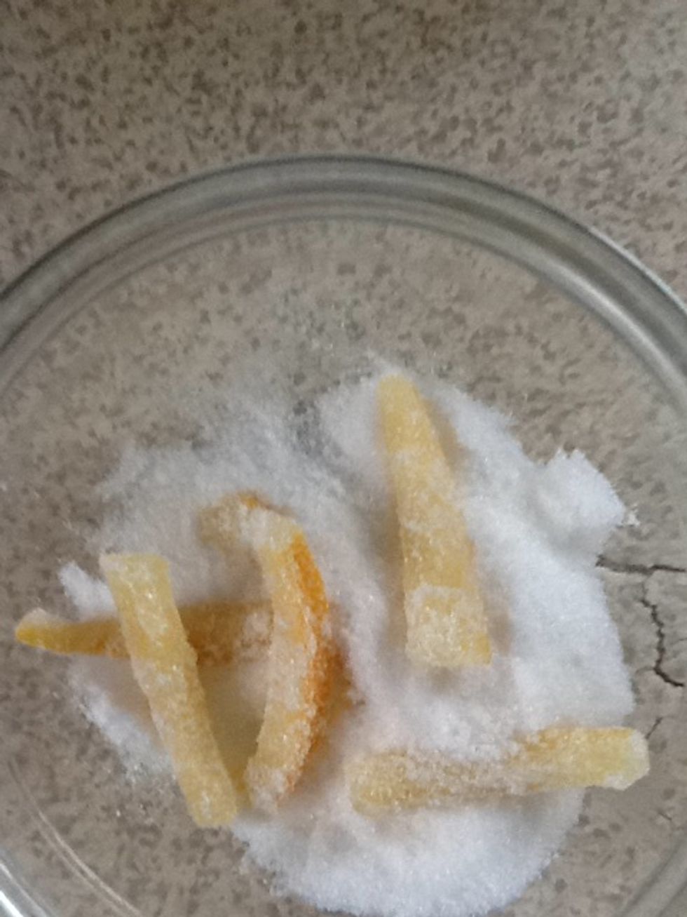 Pour some sugar in a bowl and toss the warm strips in the sugar.