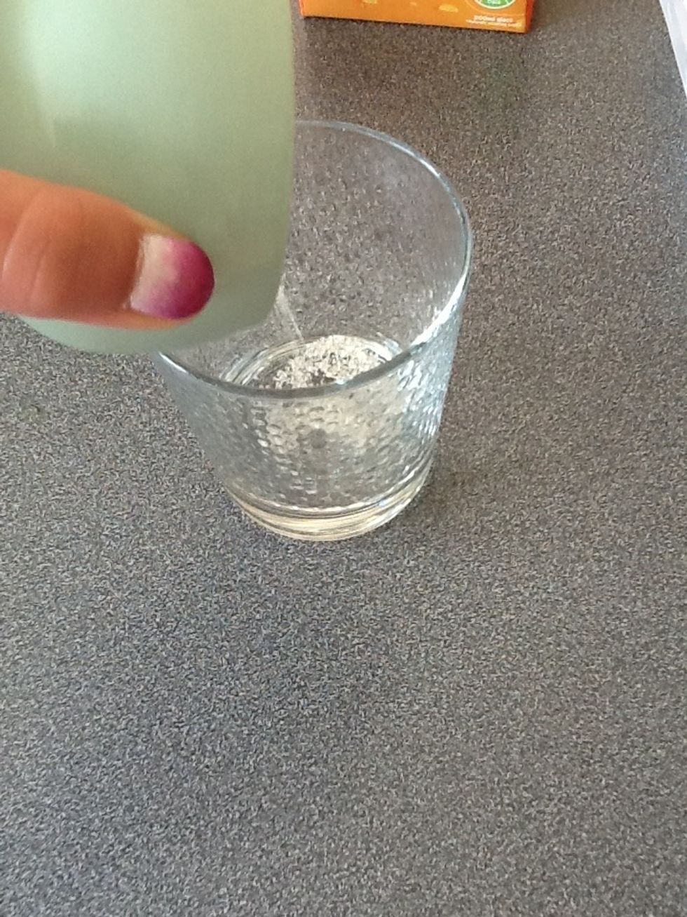 Pour some sugar into the bottom of your cup.