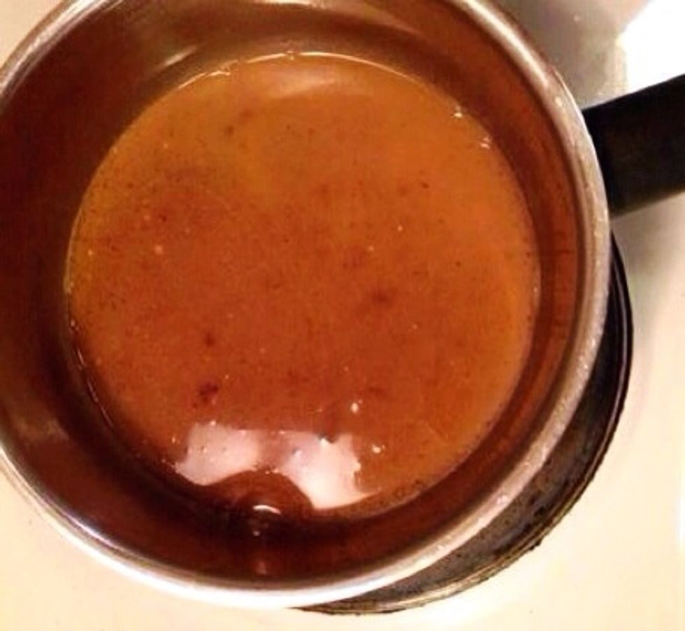 Pour some water into the frying pan and then pour the liquid into a smaller sauce pan, through a sifter. This, and the juices from the meat (once it's done) will be the gravy base.