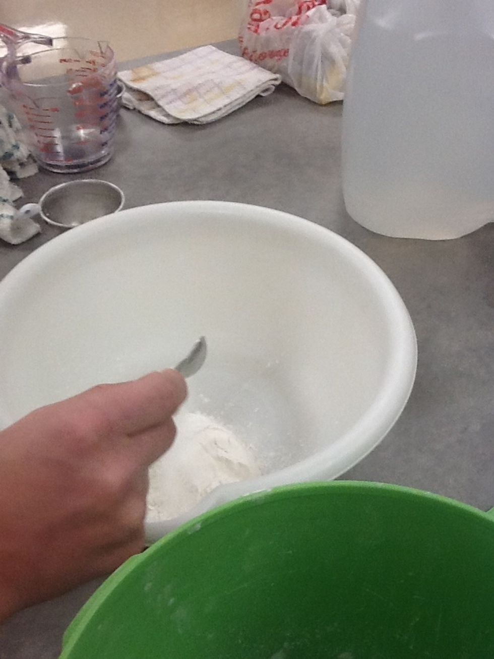 Pour sugar into bowl.