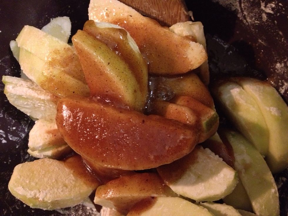 Pour sugar mixture over the apples and mix well.