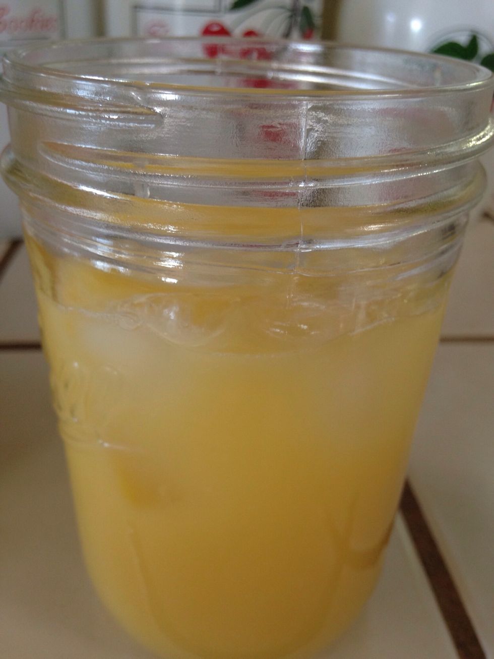 Pour tequila and orange juice over ice in glass.