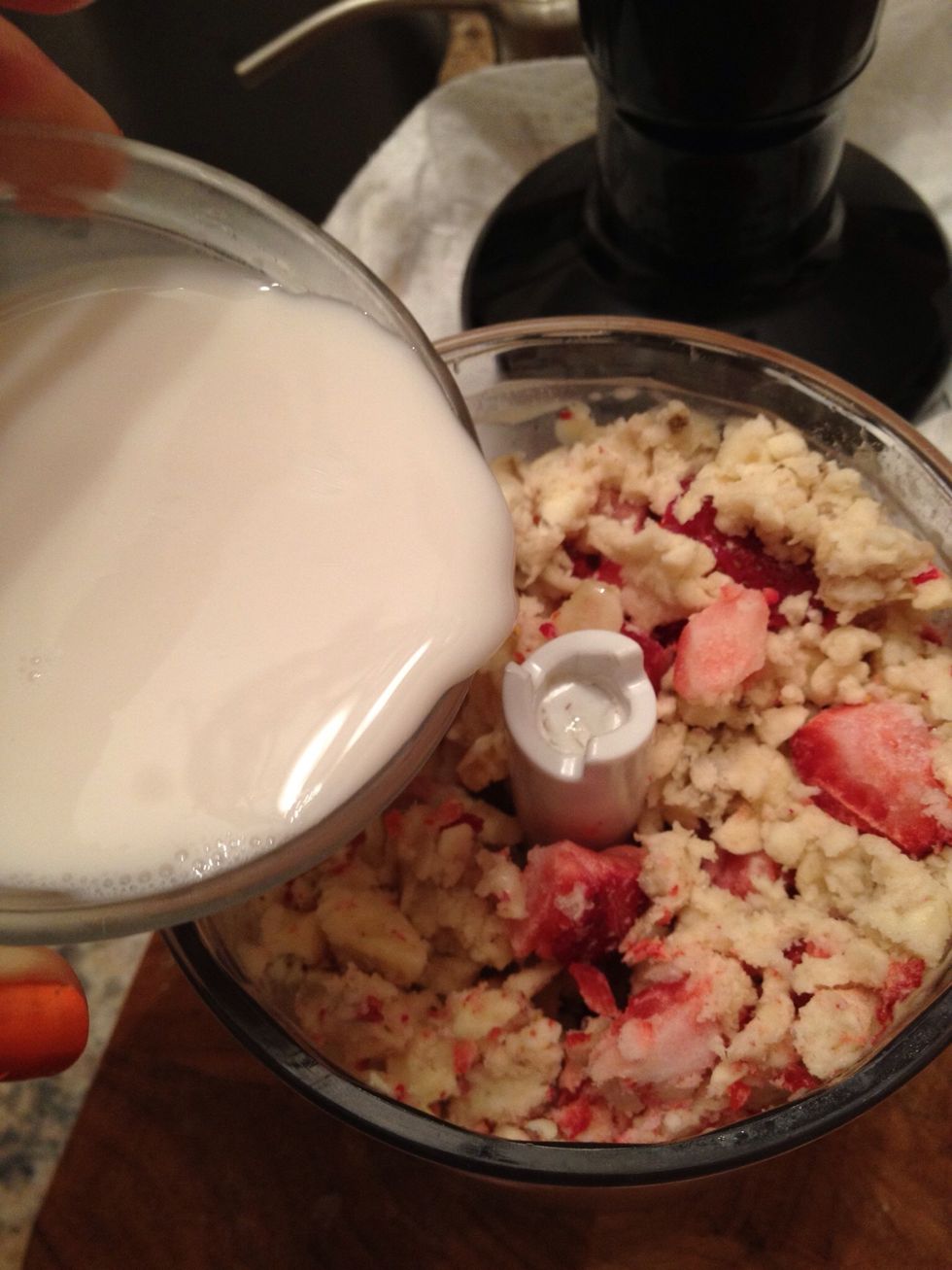 Pour the almond milk. Process until smooth