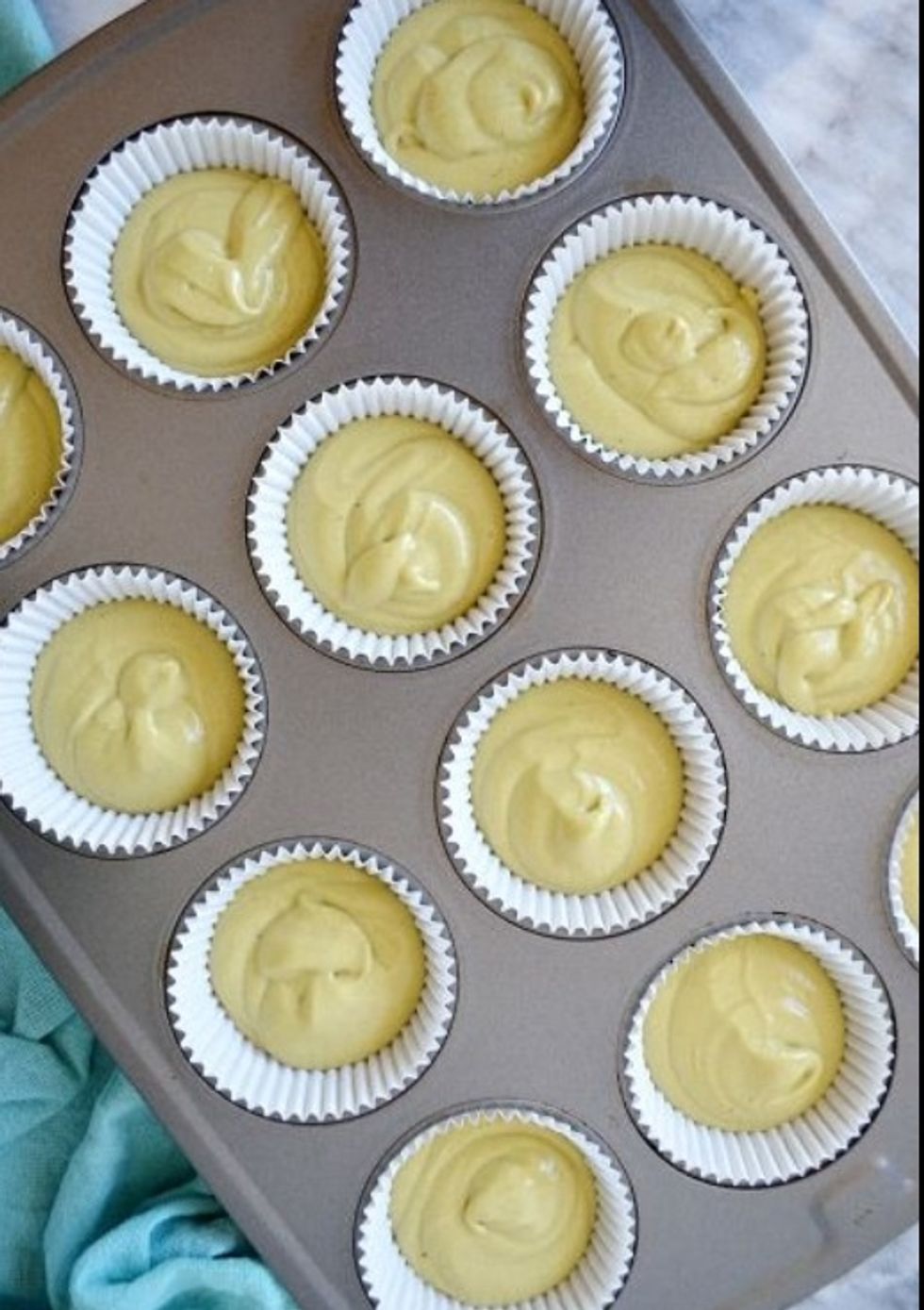 Pour the batter equally in cupcake liners. Bake them until they're golden