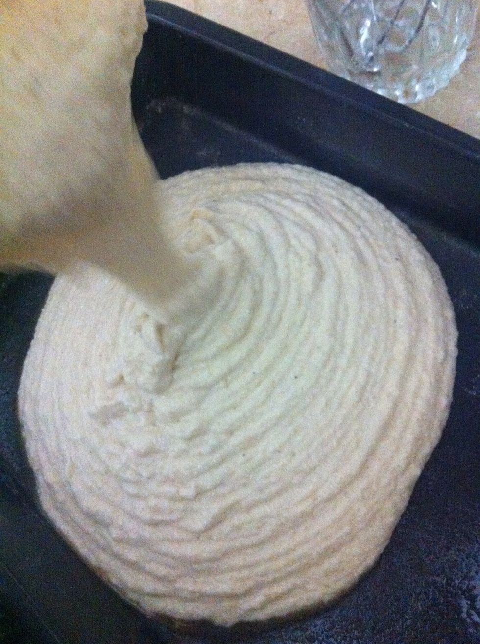 Pour the batter in a greased pan