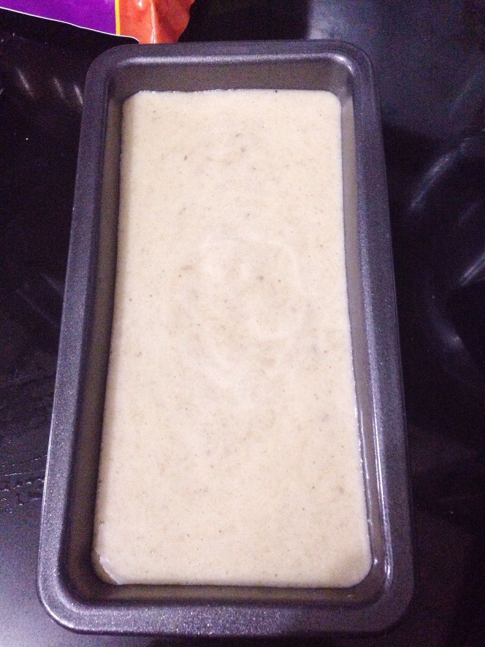 Pour the batter into loaf pan. At this point you can dump in chocolate chips, or for healthier version just dump in chopped dates. Bake it in preheated oven at 160C (320F) for about 50 minutes