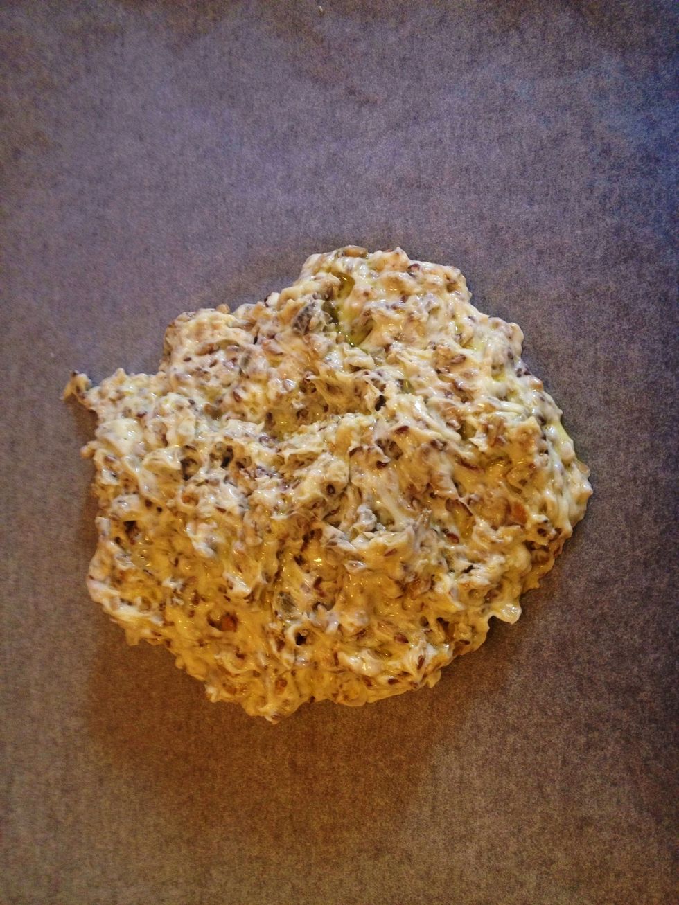 Pour the batter onto an oven plate.
