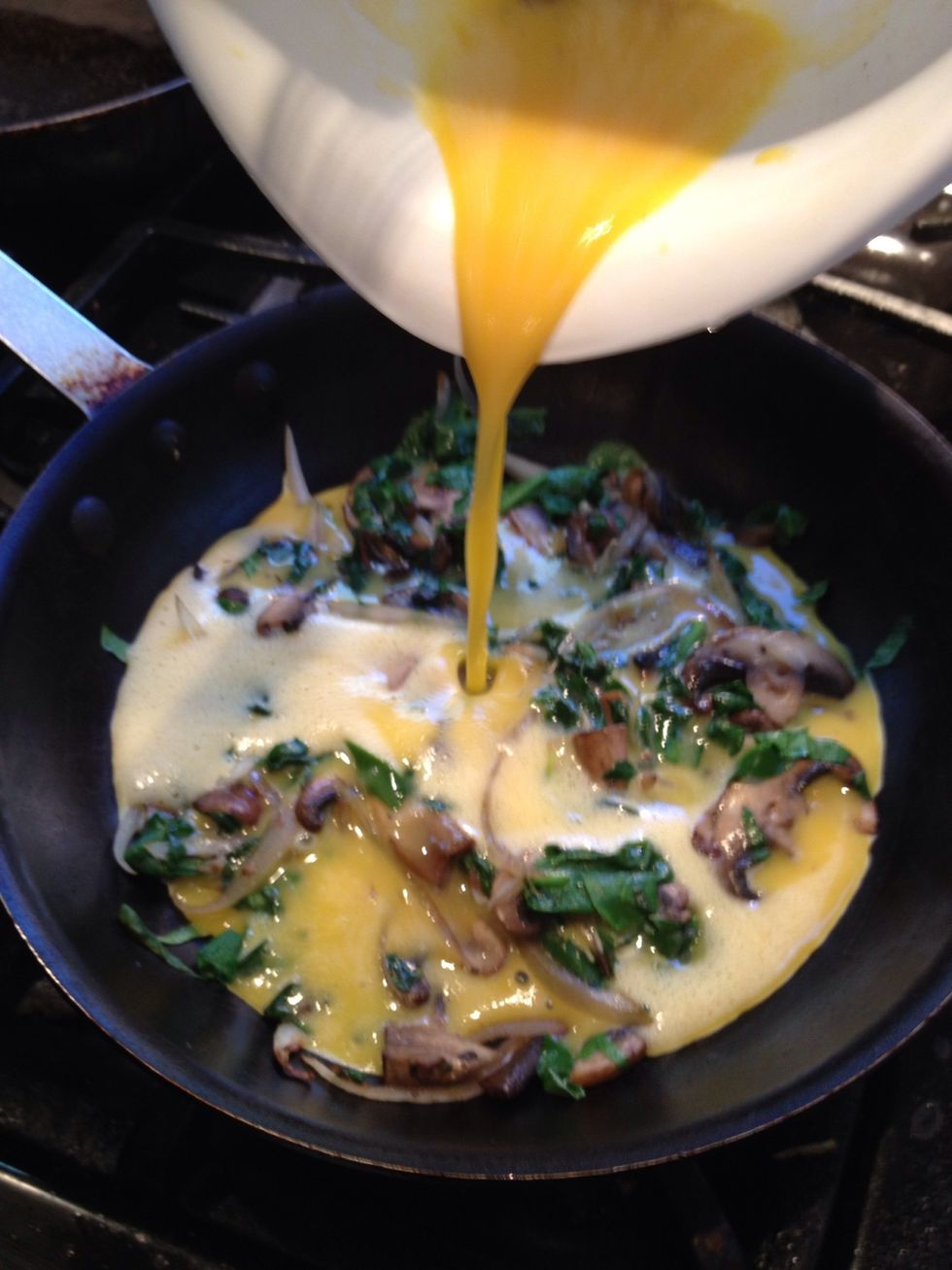 Pour the beaten eggs