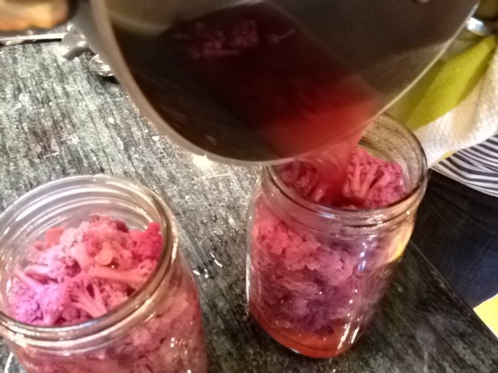 Pour the brine into each jar.