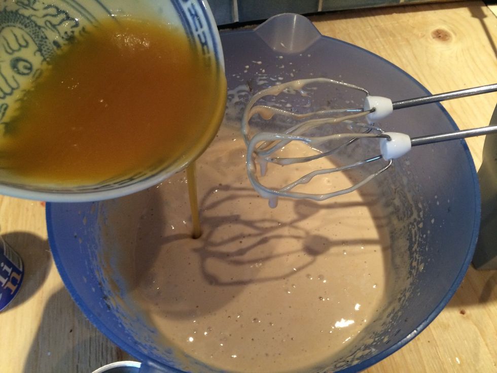 Pour the butter mixture into the egg mixture and blend.