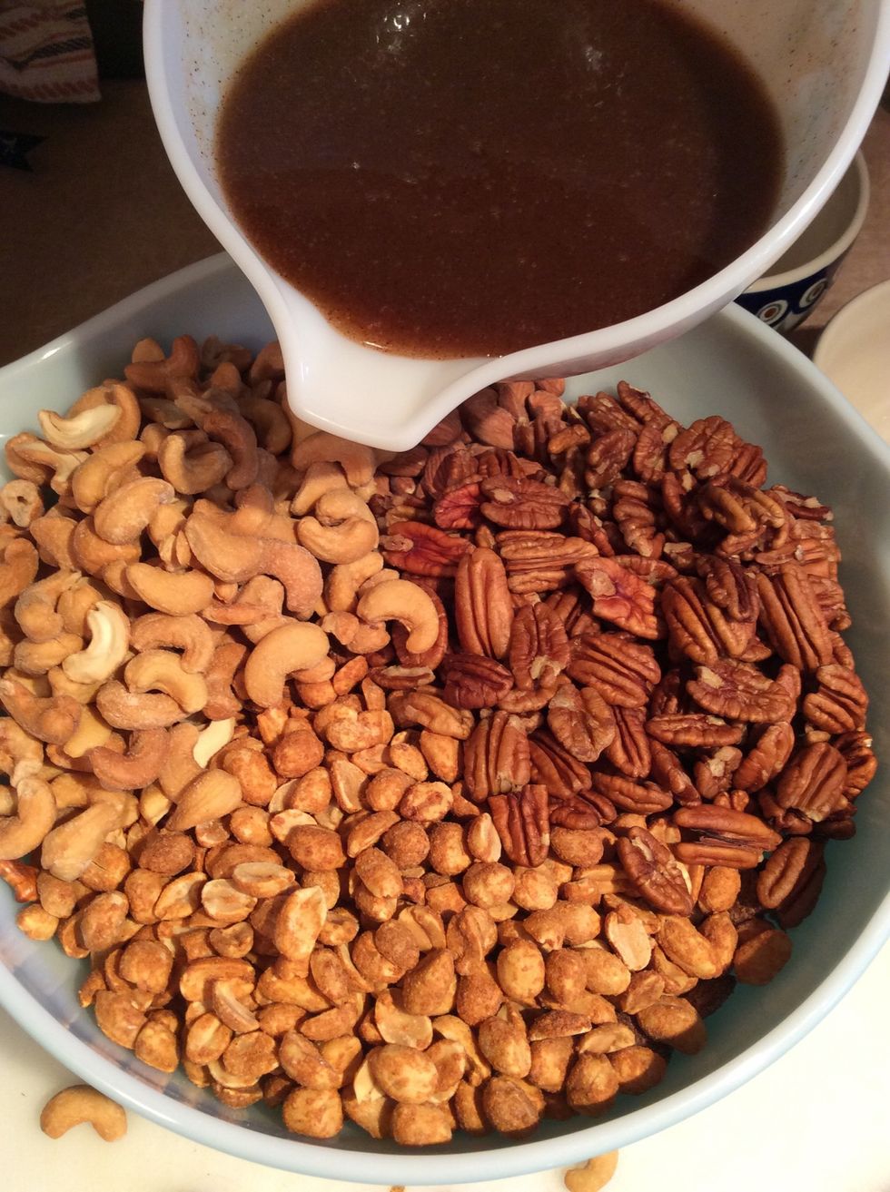 Pour the butter mixture over the snack mix ....