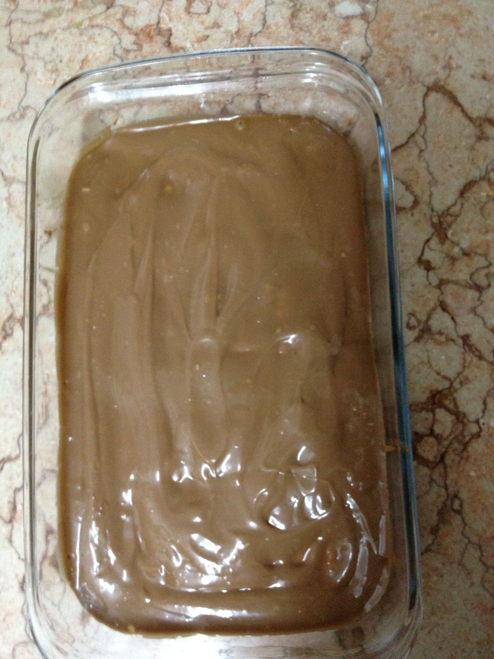 Pour the cadbury mix while the cake is hot