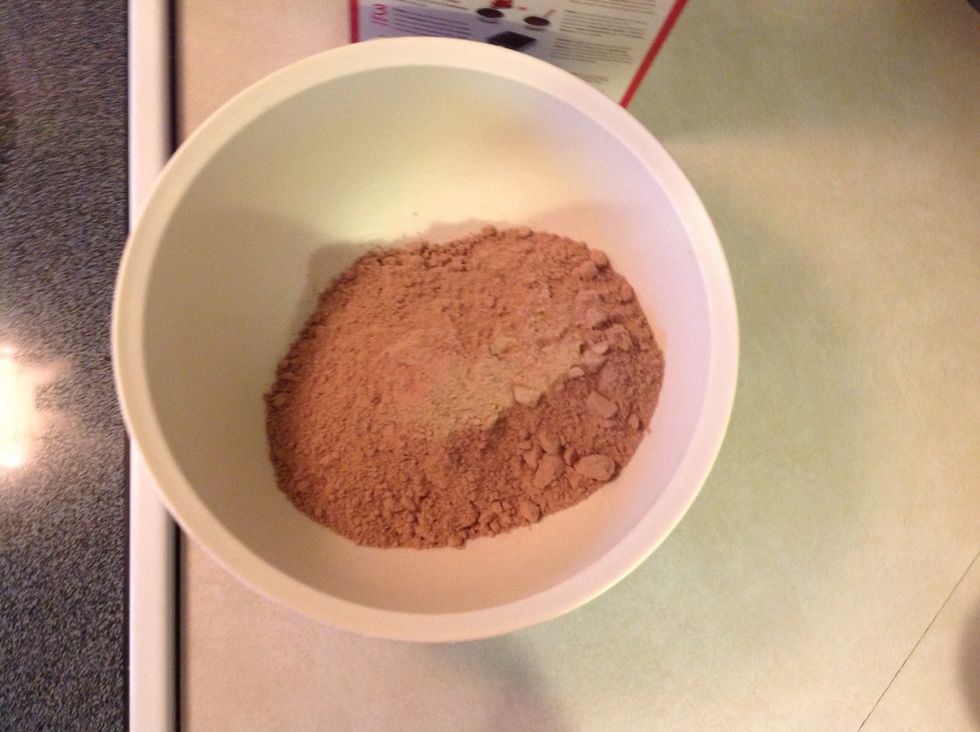 Pour the cake mix into the medium sized bowl