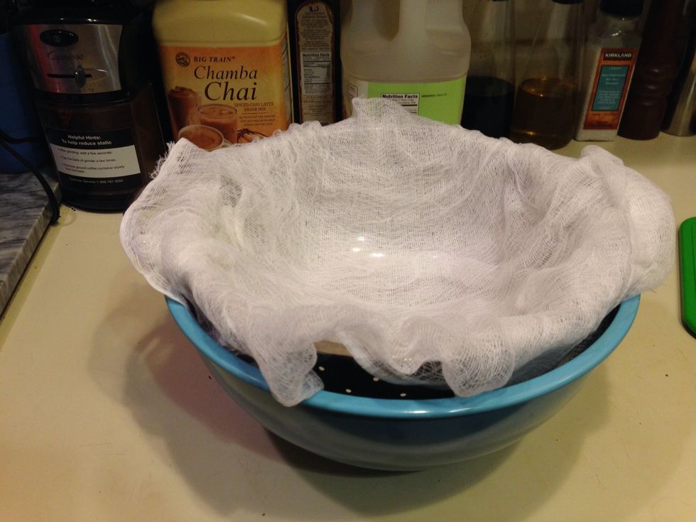 Pour the chicken broth into the two bowls. This pulls out all of the extra garlic and any sediment.