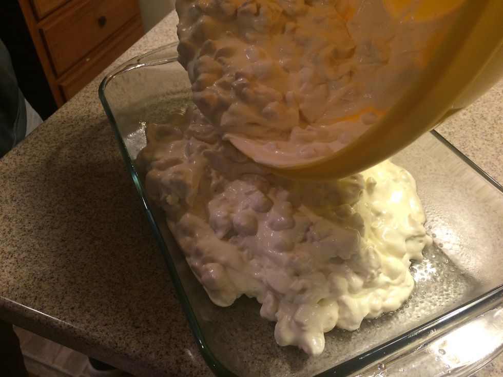 Pour the chicken, soup, and sour cream into cooking tray.