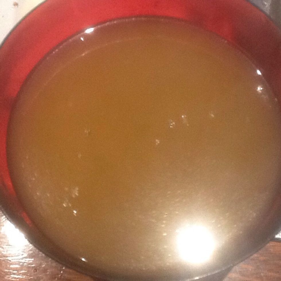 Pour the chicken stock into a bowl and then add 4 cups of boiling water