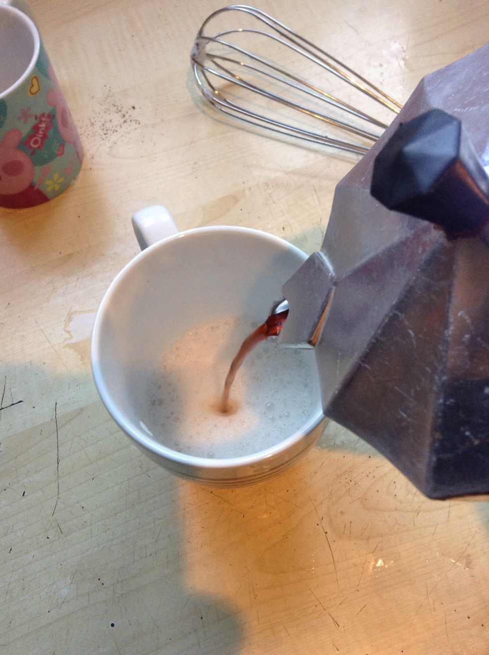 Pour the coffee in the centre of the foamed milk,dont rush it otherwise the milk will mix in, and it will just taste like a normal coffee.