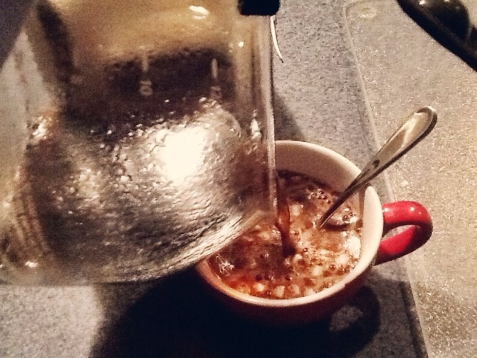 Pour the coffee into already-made hot cocoa, filling to about half an inch below the rim of your mug.