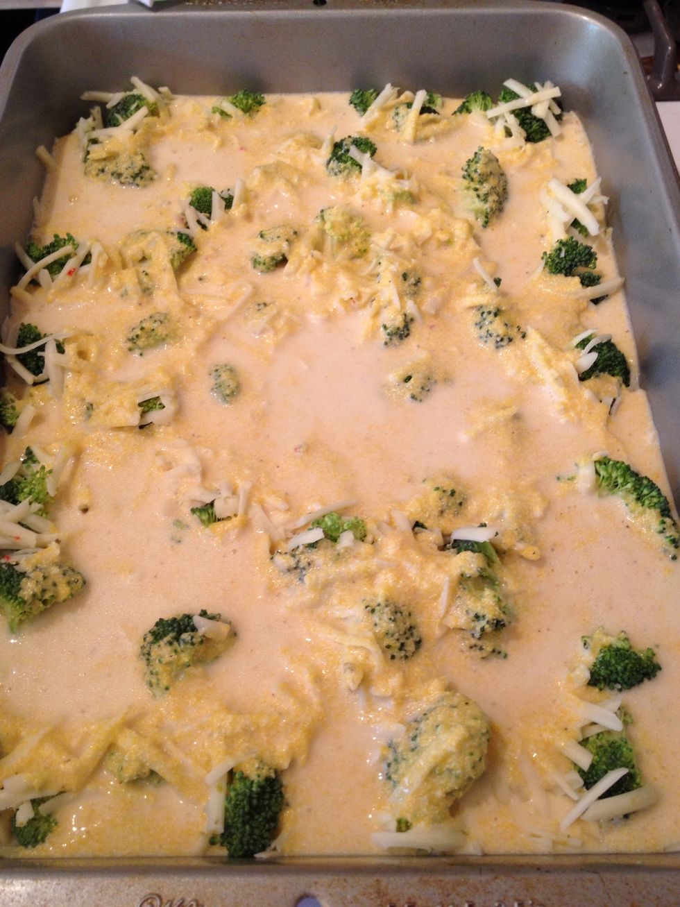 Pour the corn bread batter evenly over the broccoli florets. The batter will rise during baking.