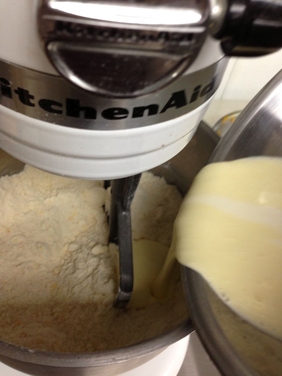 Pour the cream mixture into the batter.