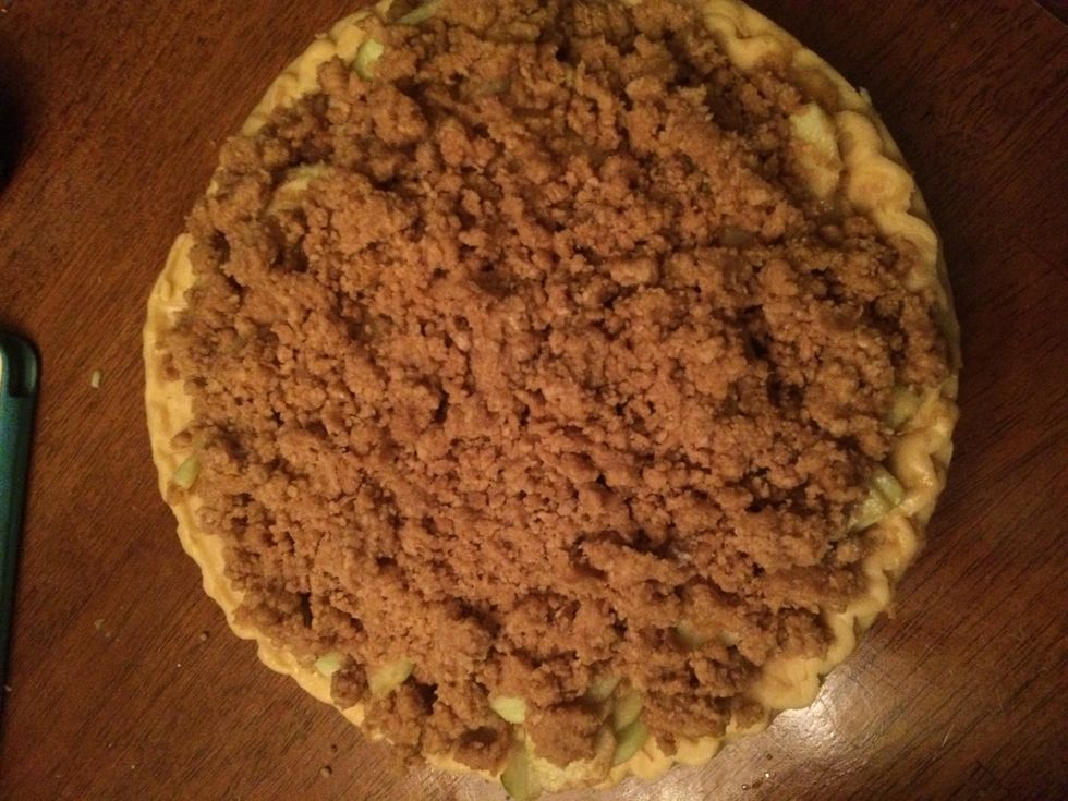 Pour the crumbs over the apples to make an even layer.