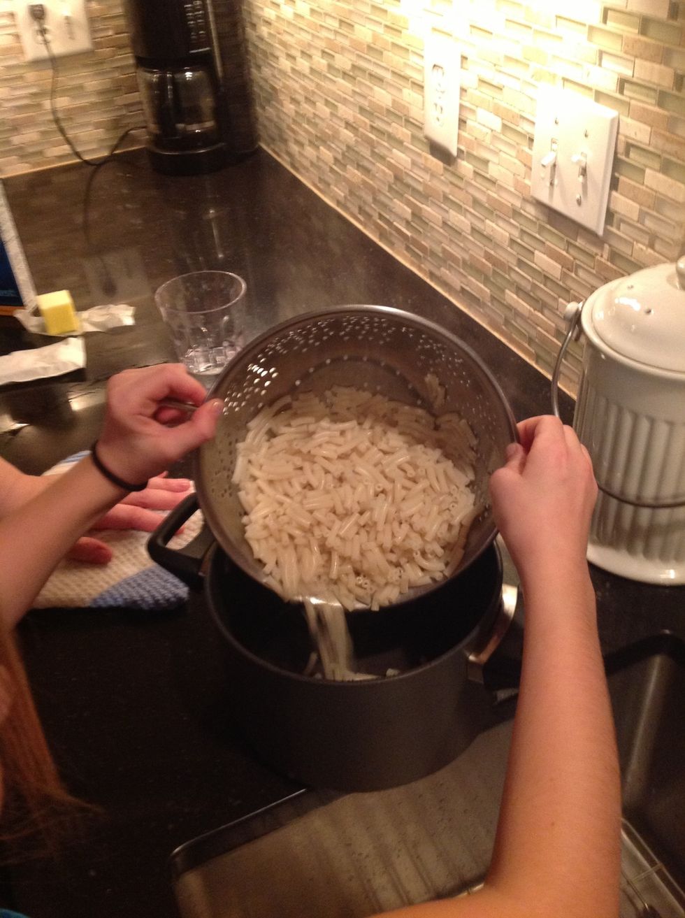 Pour the drained noodles back into the sauce pan.