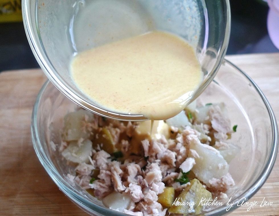 Pour the dressing over the salad.