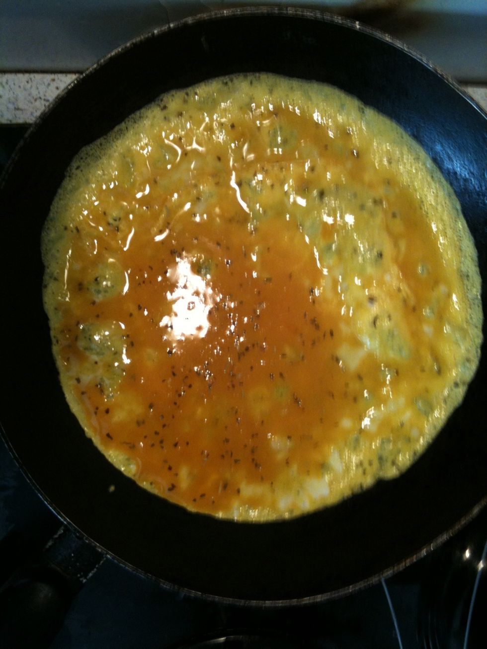 Pour the egg mixture in it