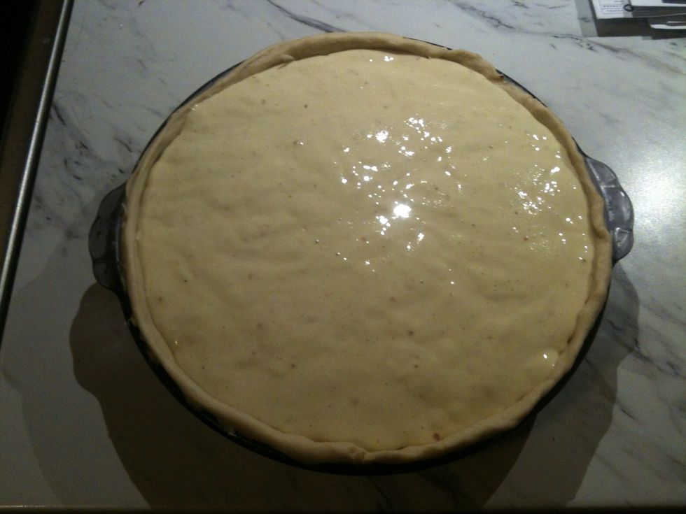 Pour the egg mixture on top of cheese.