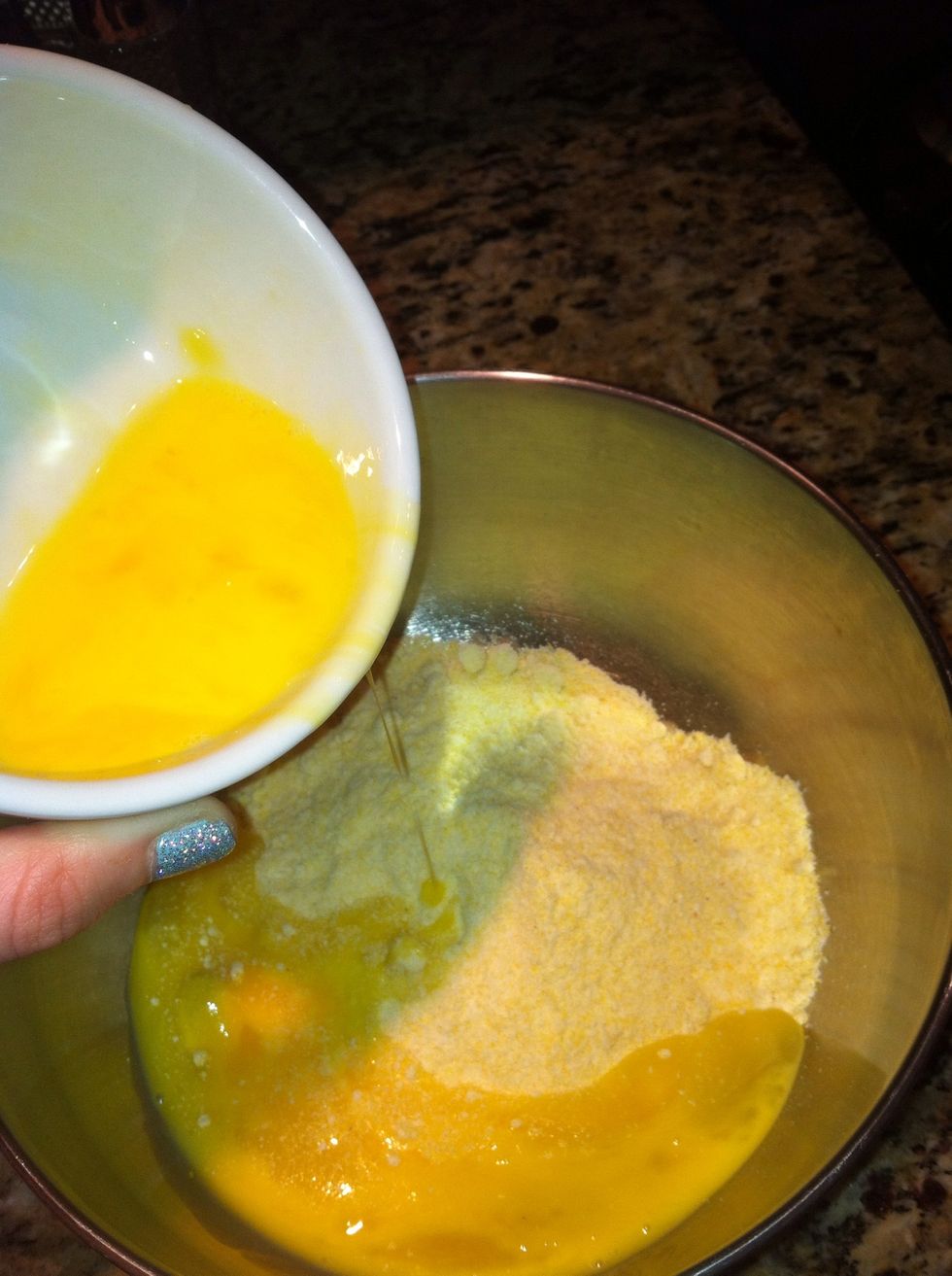 Pour the eggs into the bowl with the Jiffy mix