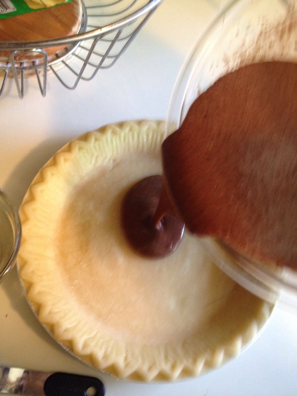 Pour the filling in the crust.