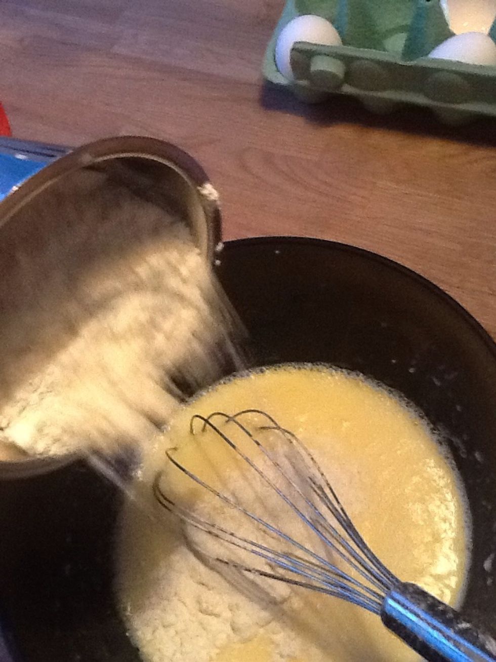 Pour the flour into the bowl.